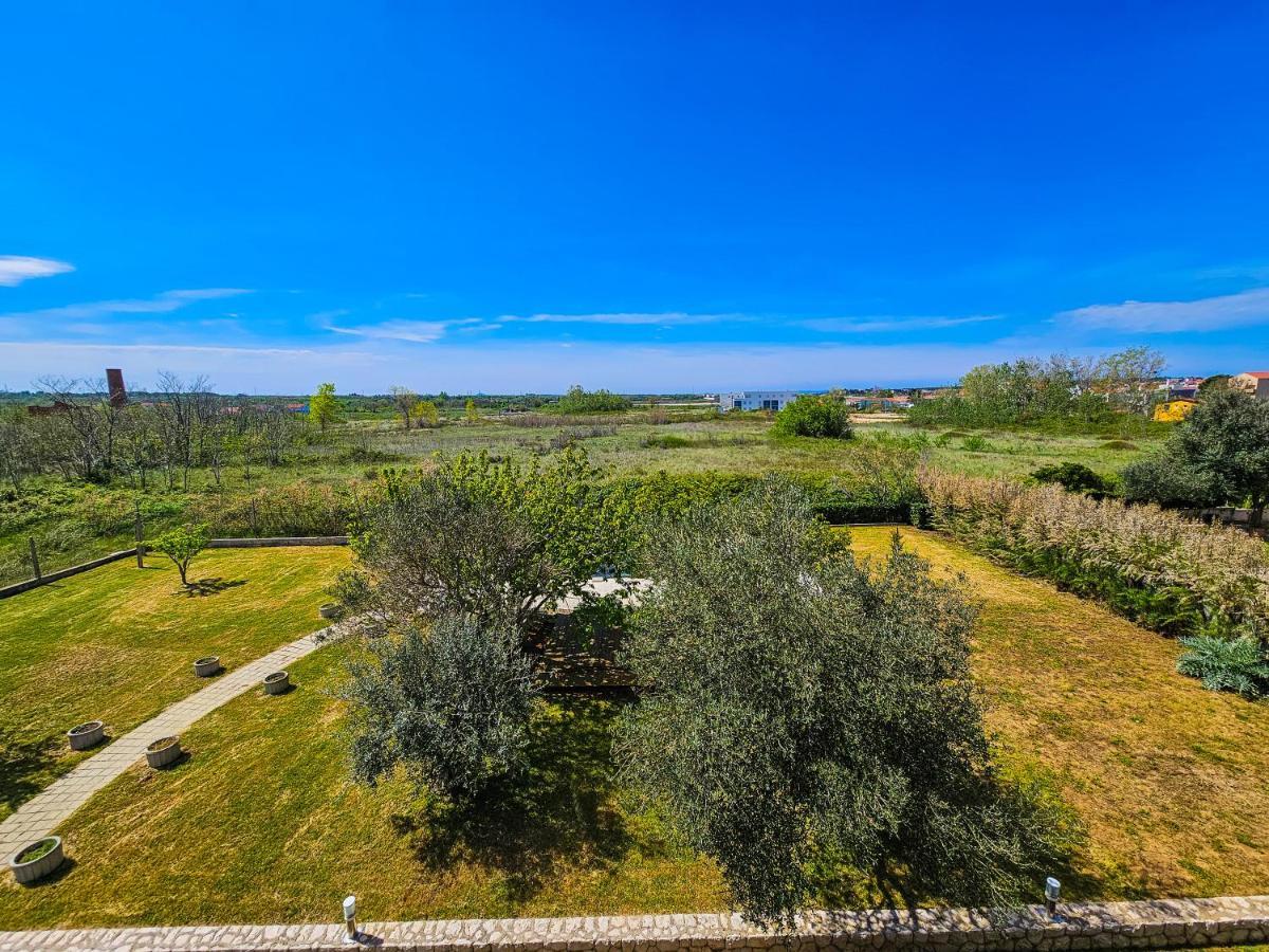 נין Aenona Sea View Apartments מראה חיצוני תמונה
